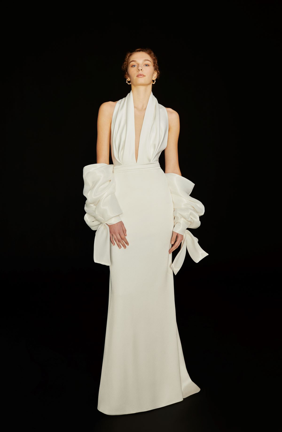Deep V neck backless gown with draped detail belt and bow bomber