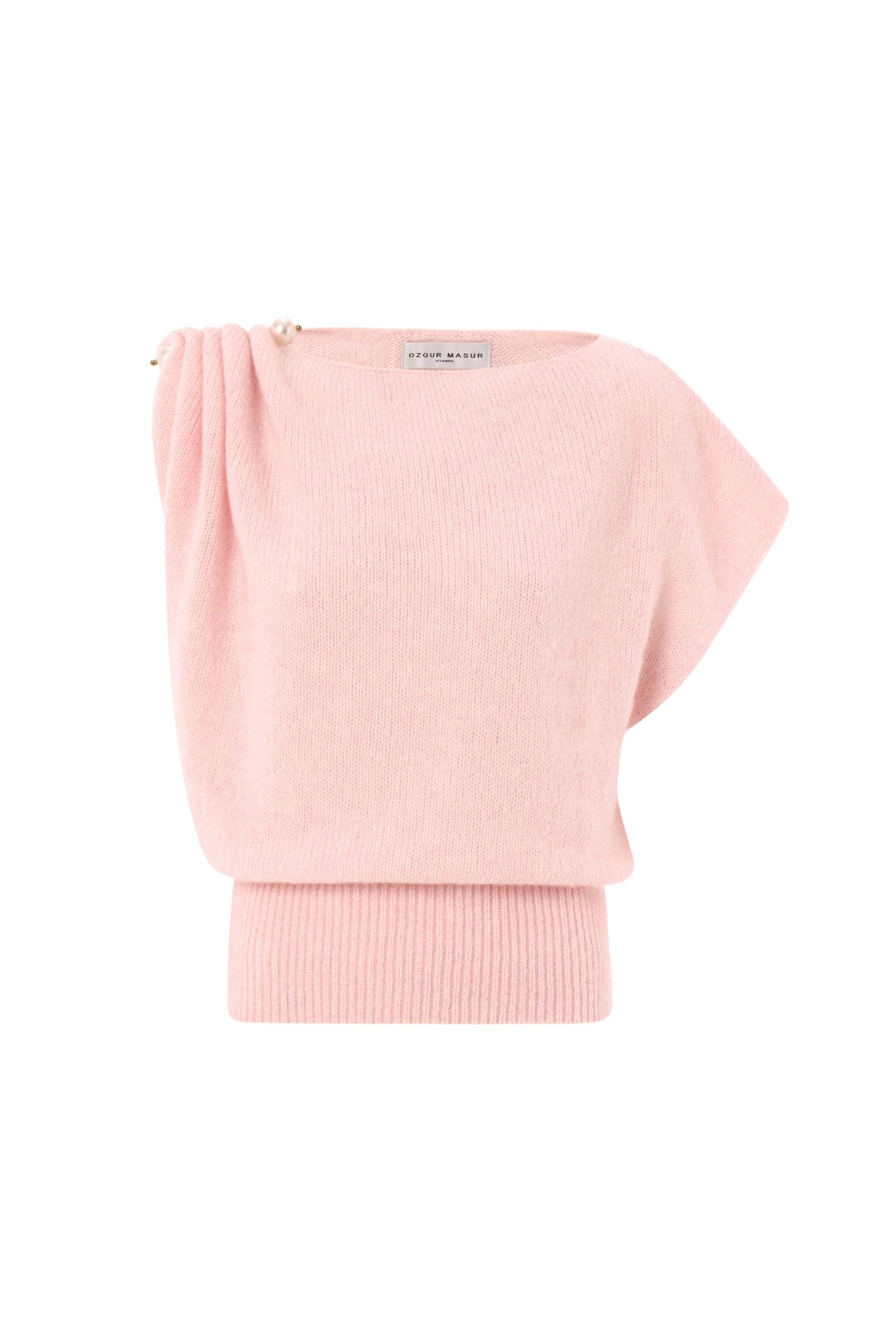 Soft knit asymmetric shoulder top with pearl accessory.