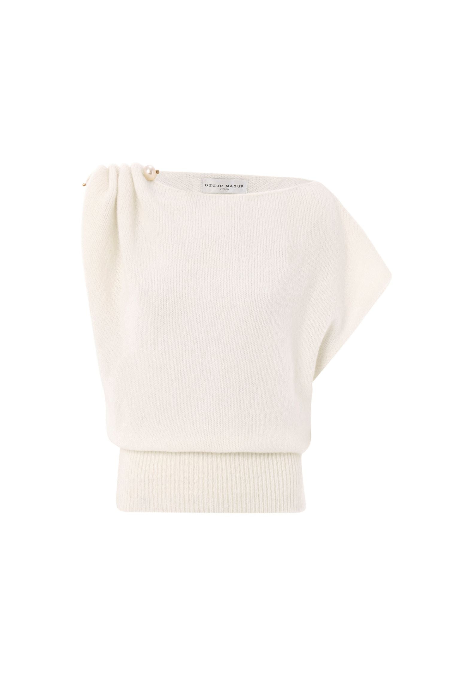 Soft knit asymmetric shoulder top with pearl accessory.